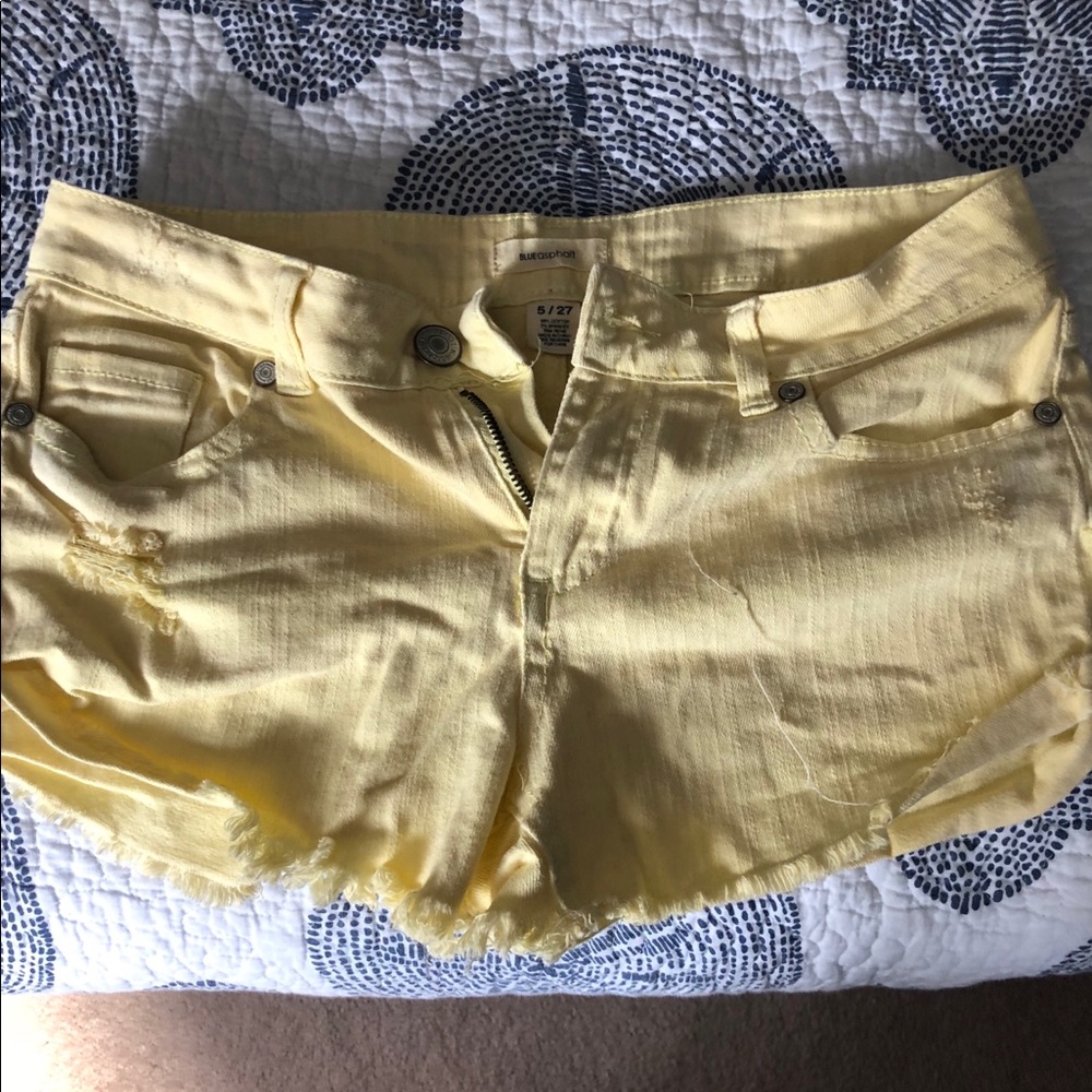 Three pairs of Blue Asphalt jean shorts.